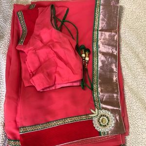 Saree. With blouse and petticoat.